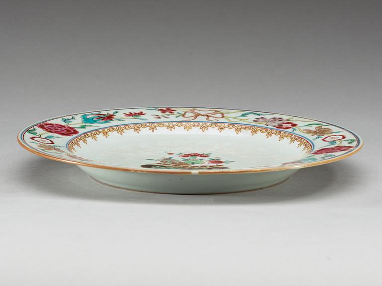 A set of 15 famille rose plates, Qing dynasty, Yongzheng (1723-35).