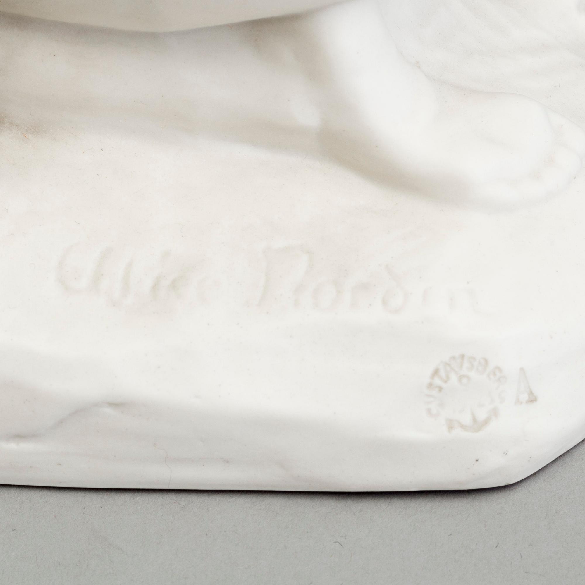 THREE PARIAN FIGURES, Gustafsberg, early 20th century, one unmarked.