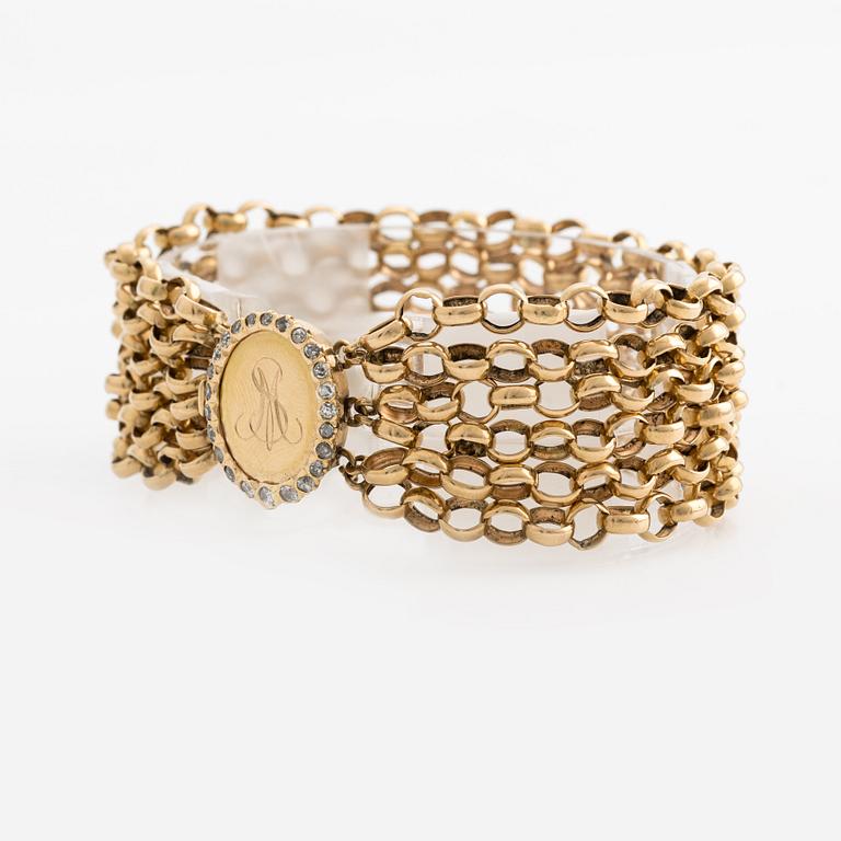 Bracelet, gold multi-strand pea links, monogram with frame of old-cut diamonds.