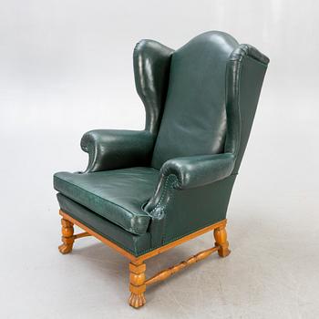 A  mid 1900s leather armchair.
