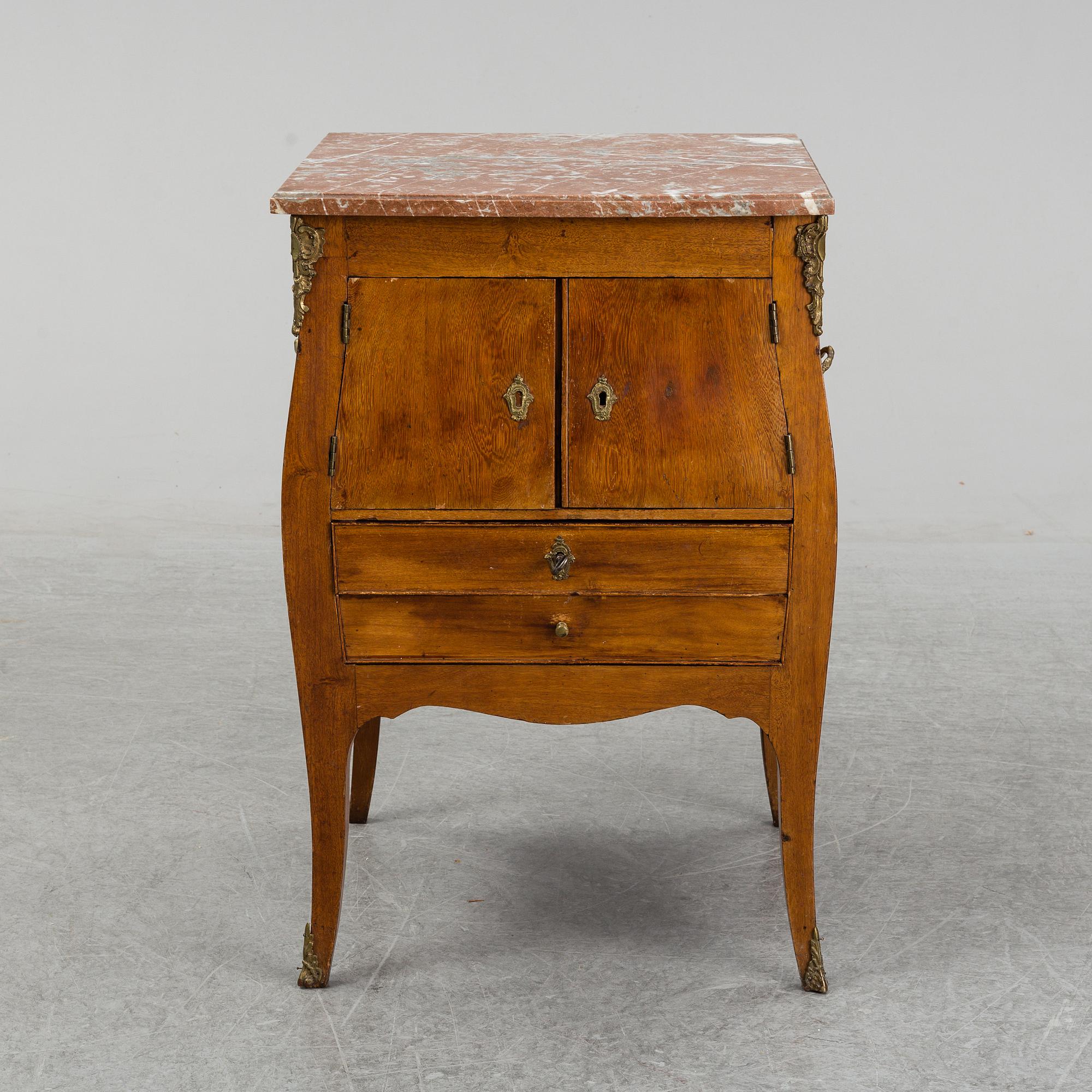 A Rococo cabinet, 18th Century.