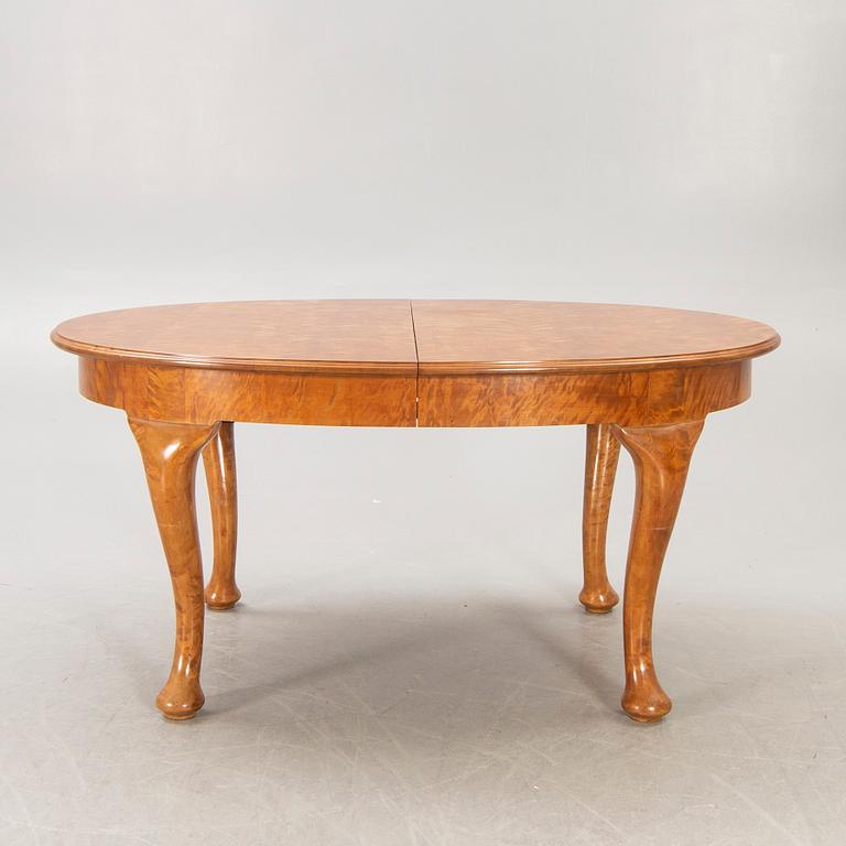 An eleven pcs birch Rococo style dining group early 1900s from Mobilia Malmö.