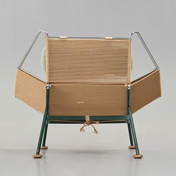 Hans J. Wegner, a 'Flag Halyard' easy chair, Getama, Denmark.