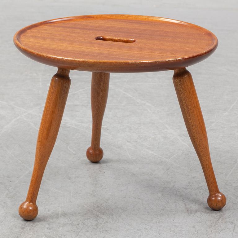 A mahogny stool, model 2156, by Josef Frank for Firma Svenskt Tenn.