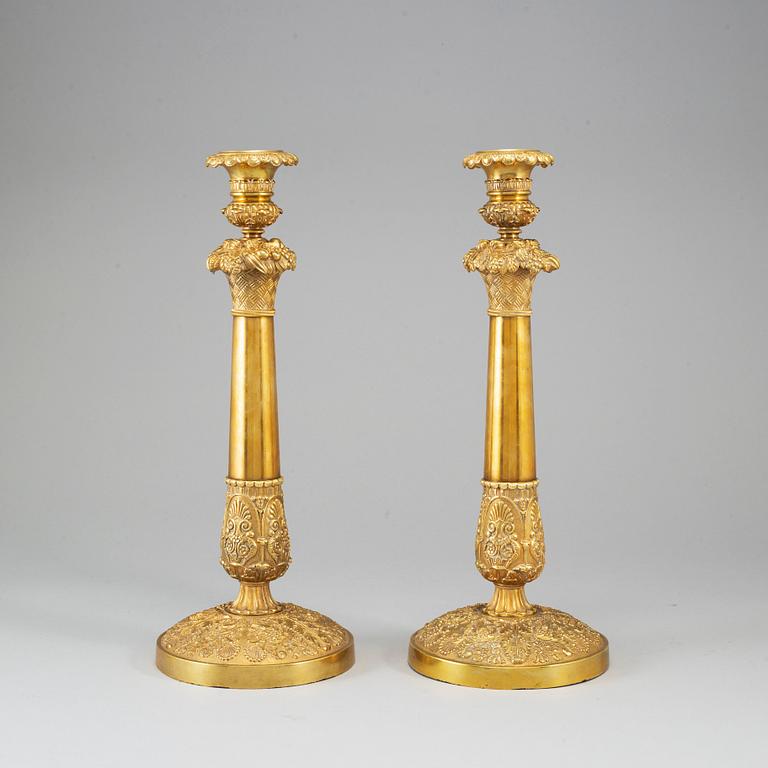 A pair of French Empire candlesticks, first half of the 19th century.