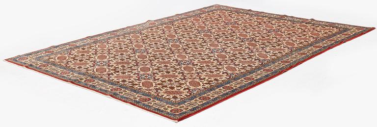 A fine mid 20th century Qum carpet of Zeichur design, Central Iran, c. 318 x 235 cm.