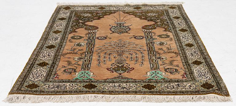 A silk Quum rug, c. 155 x 103 cm.