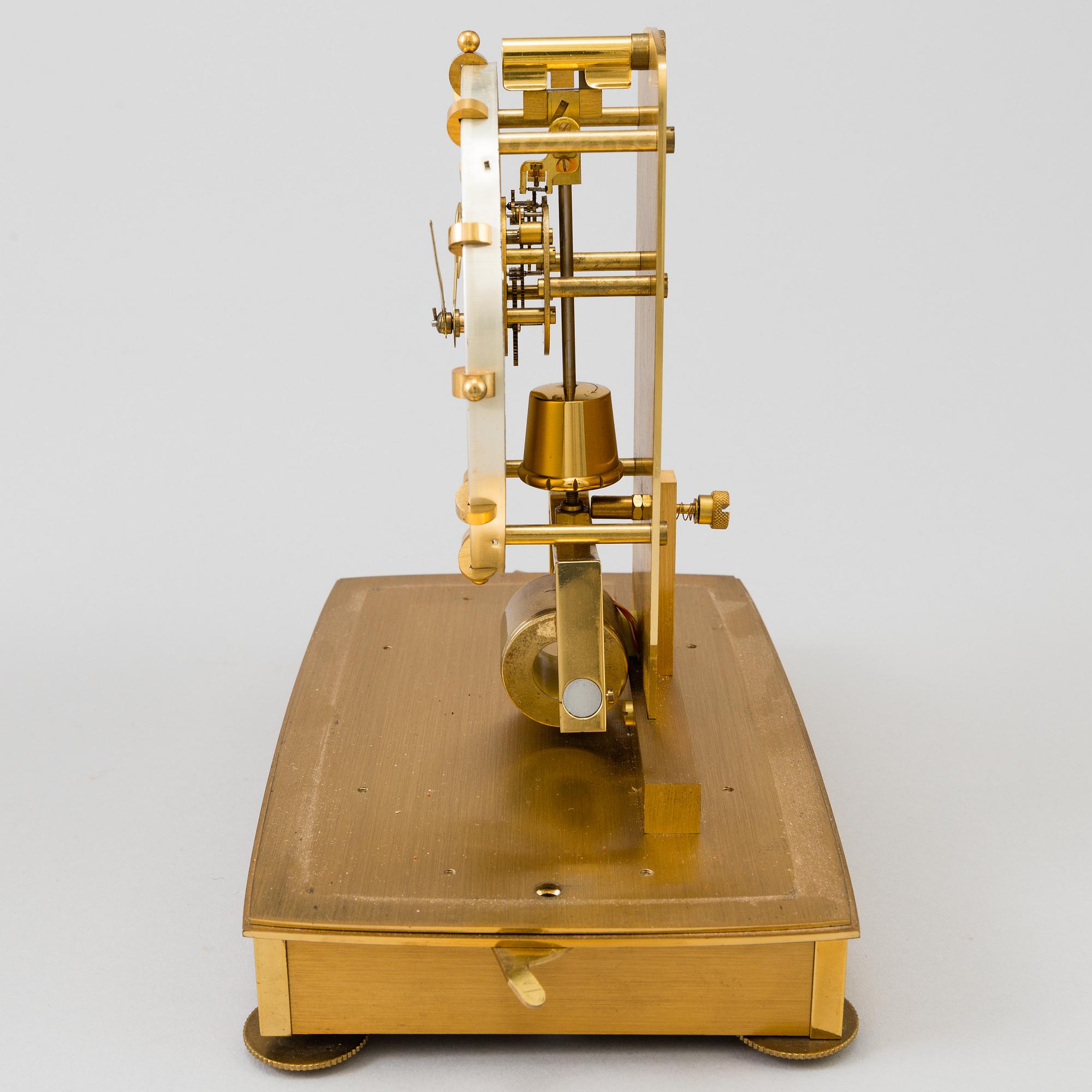A table clocks, brass, Kundo, 20th century.