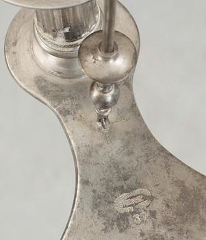 A Ferdinand Boberg four light pewter chandelier, Santesson's tenngjuteri, Stockholm 1905.