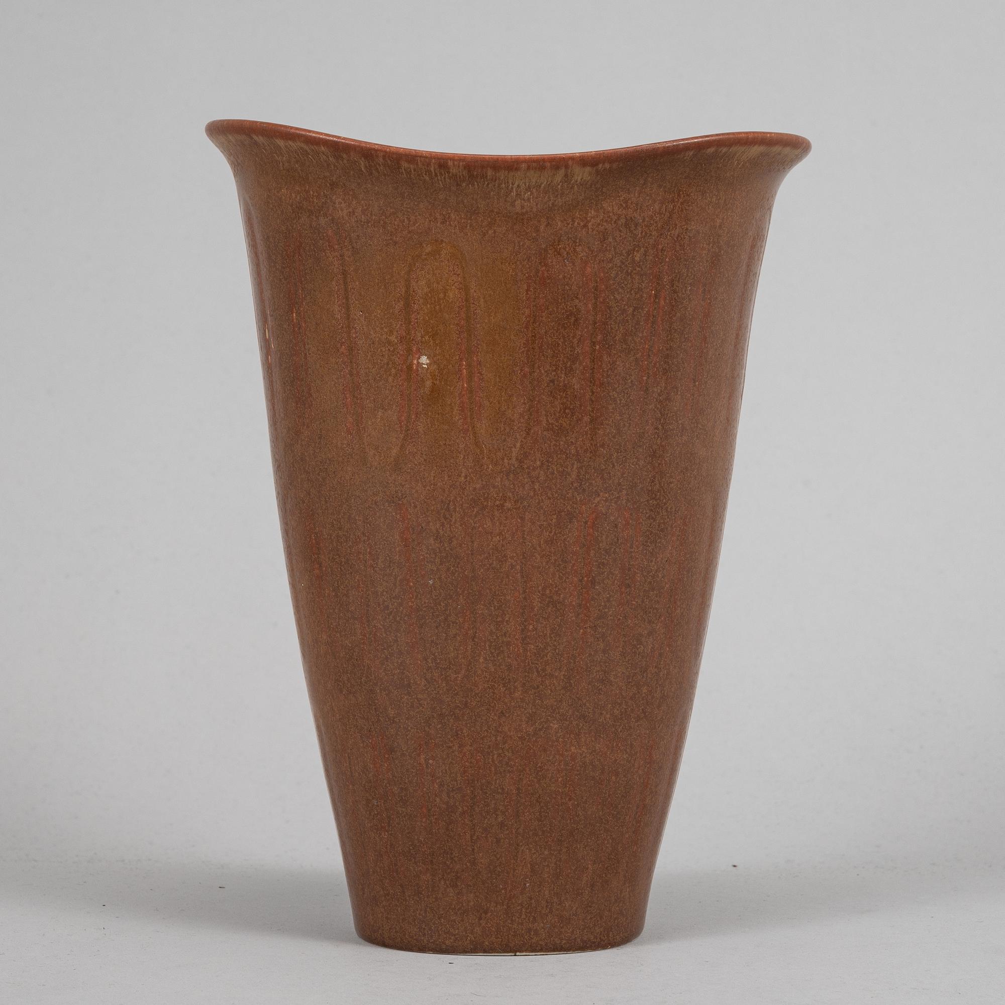 Tea pot, two bowls, two creamers, and a vase by Gunnar Nylund, stoneware, Rörstrand.