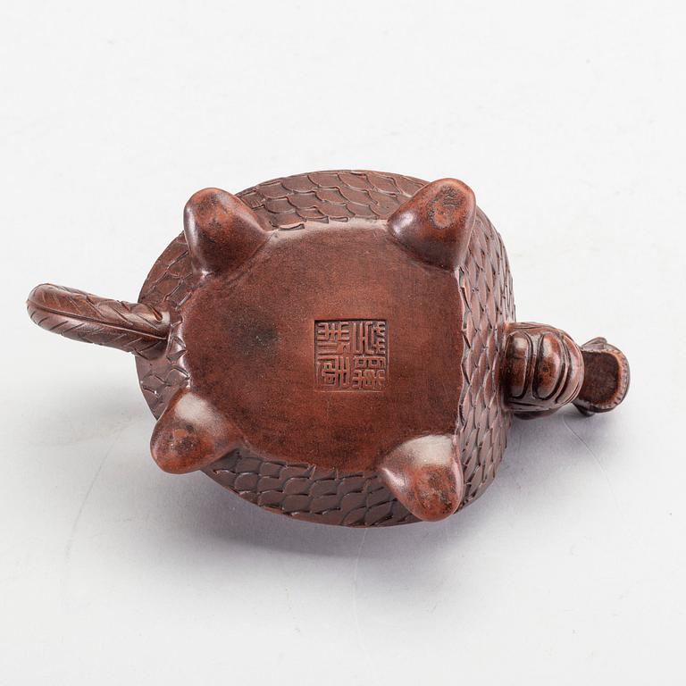 An unusual yixing tea pot, China, 20th Century. Seal to base.