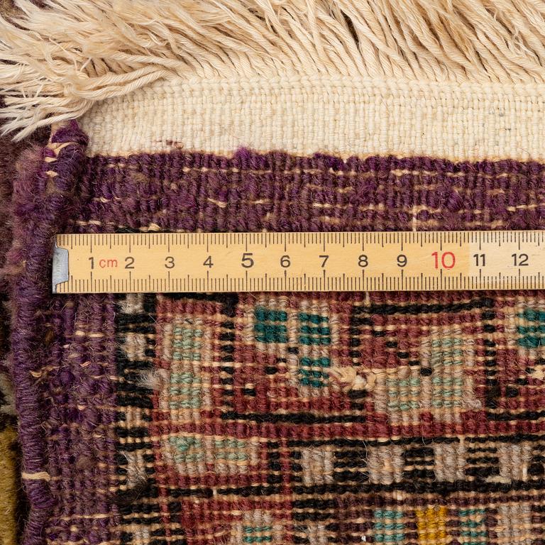 A semi-antique carpet, probably Samarkand, c. 264 x 184 cm.