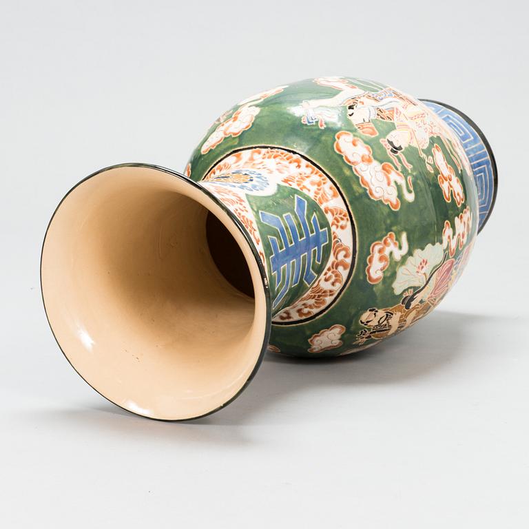 A Chinese 1950s ceramic floor urn.