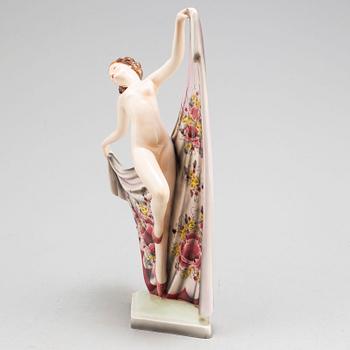 A porcelain figurine by Goldscheider, Vienna.