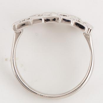 Step-cut diamond ring.