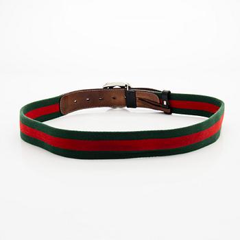 Gucci, A 'Verbier' scarf and a belt.