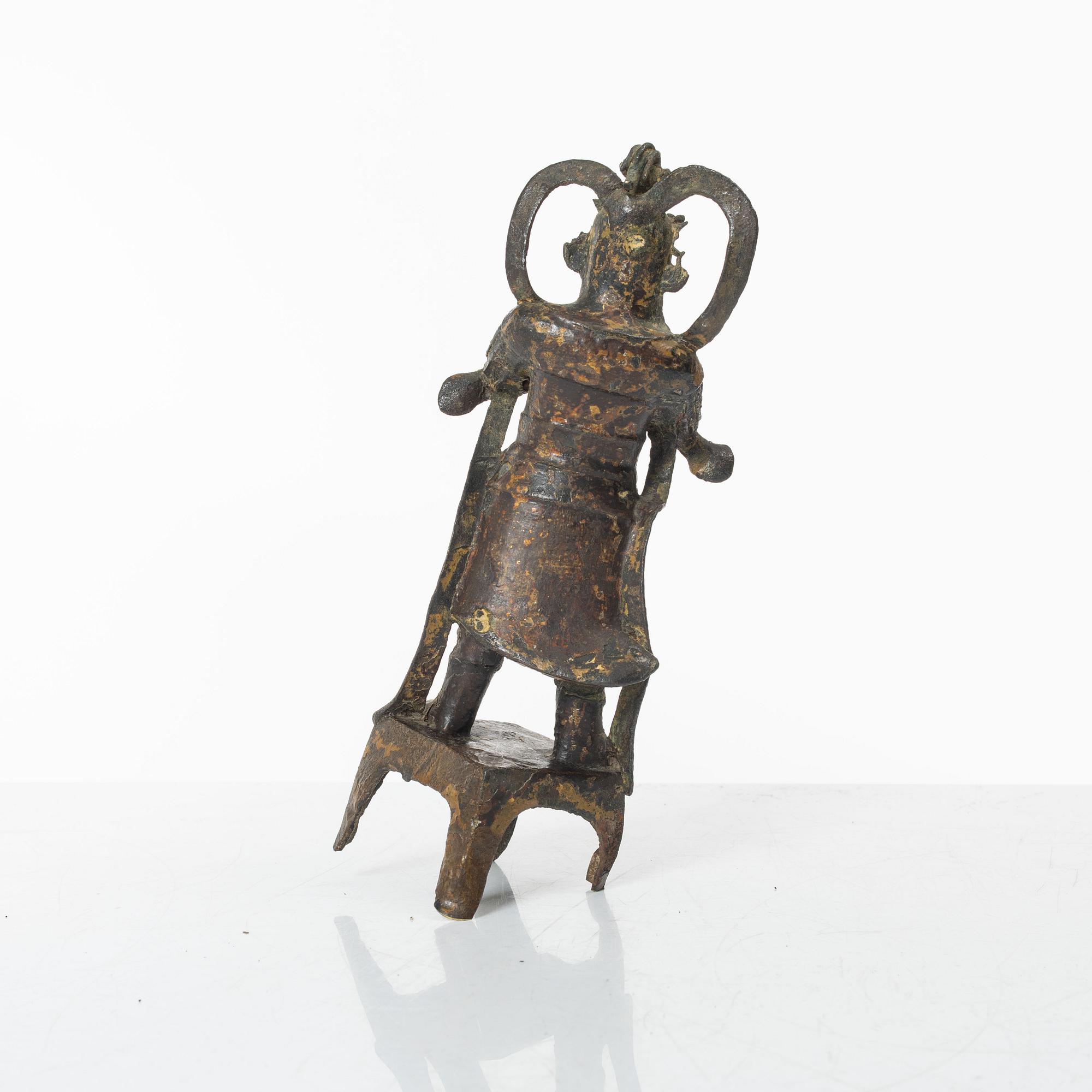 A Chinese bronze figure of a guardsman, Ming dynasty (1368-1644).