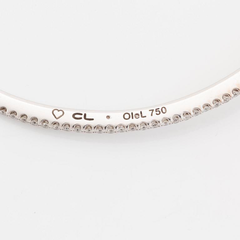 An Ole Lynggaard 18K white gold "Love" bangle set with round brilliant-cut diamonds, design Charlotte Lynggaard.