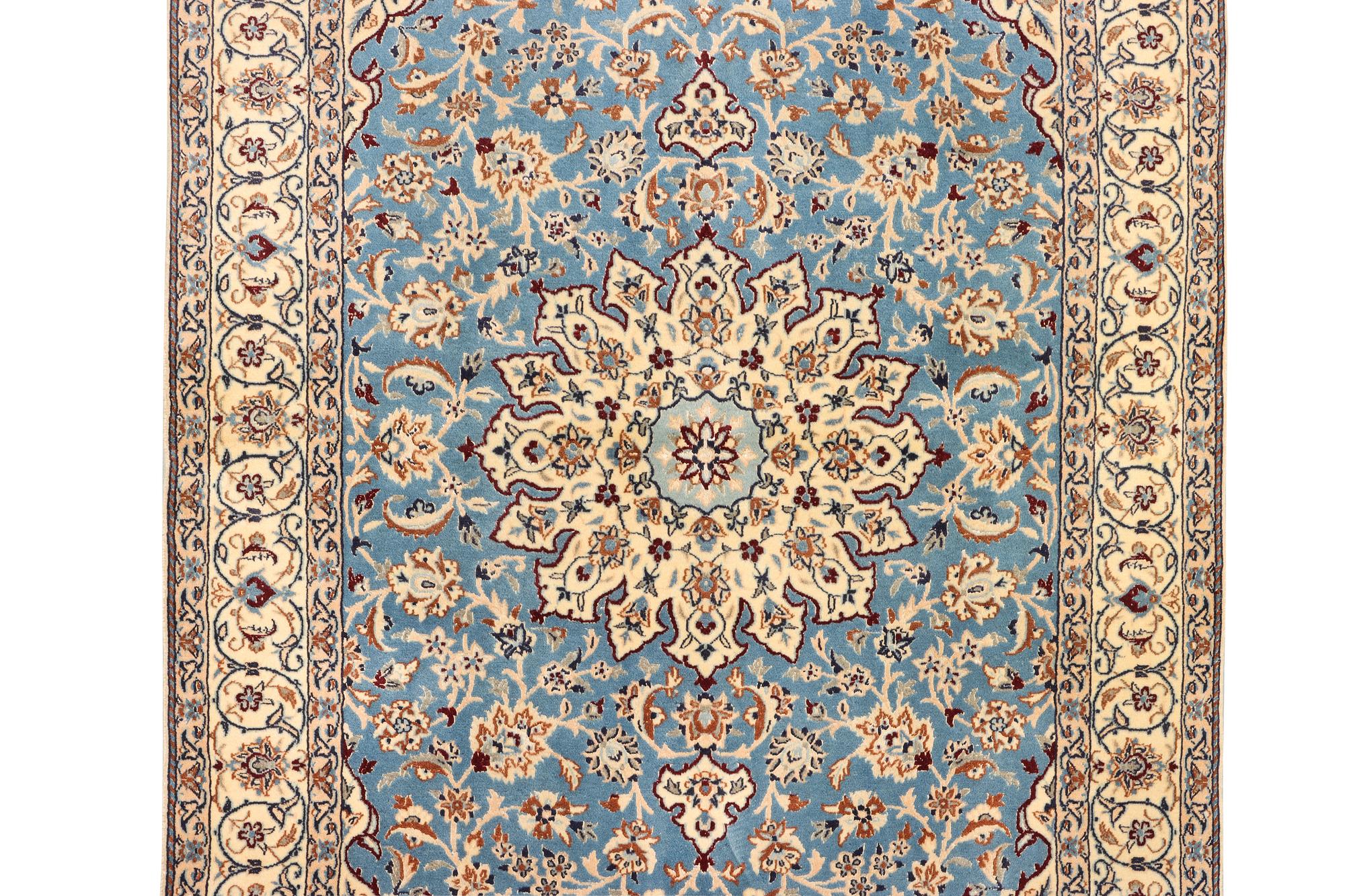 A Nain, part silk carpet, c. 196 x 120 cm.