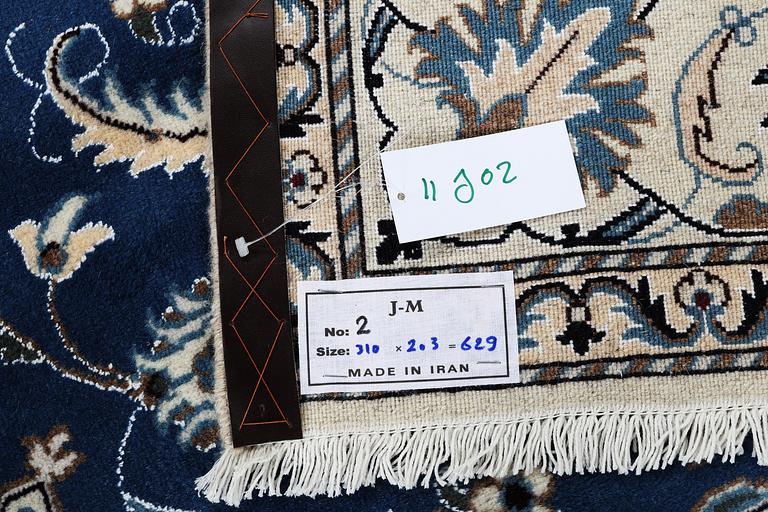 A carpet, Nain, part silk 9 LAA, ca 310 x 203 cm.