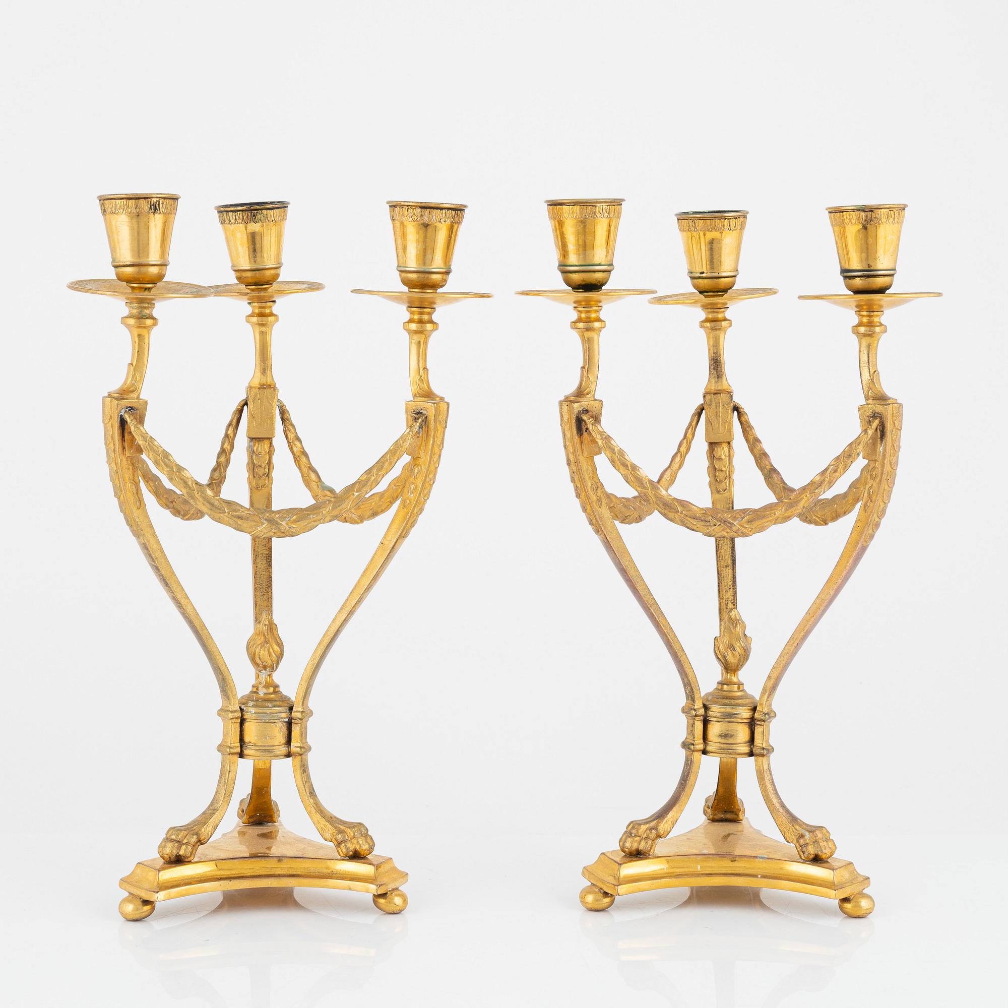 A pair of gilt candelabra, GAB, Stockholm, around the year 1900.