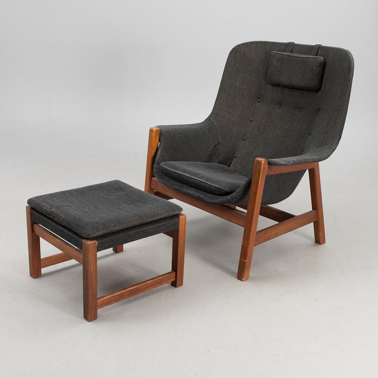 A 1960s 'Caravelle' armchair and ottoman for Puunveisto Oy - Träsnideri Ab, Finland.