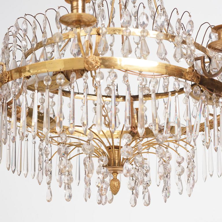 A Gustavian gilt brass and cut glass nine-branch chandelier, Stockholm late 18th century.
