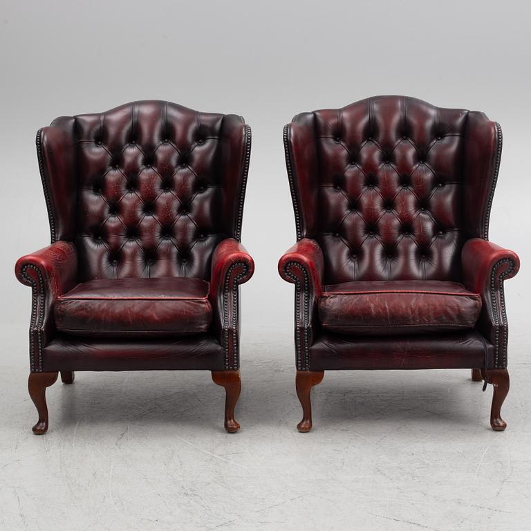 A pair of leather armchairs, end of the 20th century.