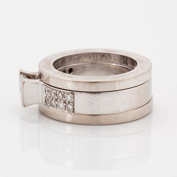 Rolf Karlsson, Three rings, 18K white gold with princess-cut and brilliant-cut diamonds, and two band rings.
