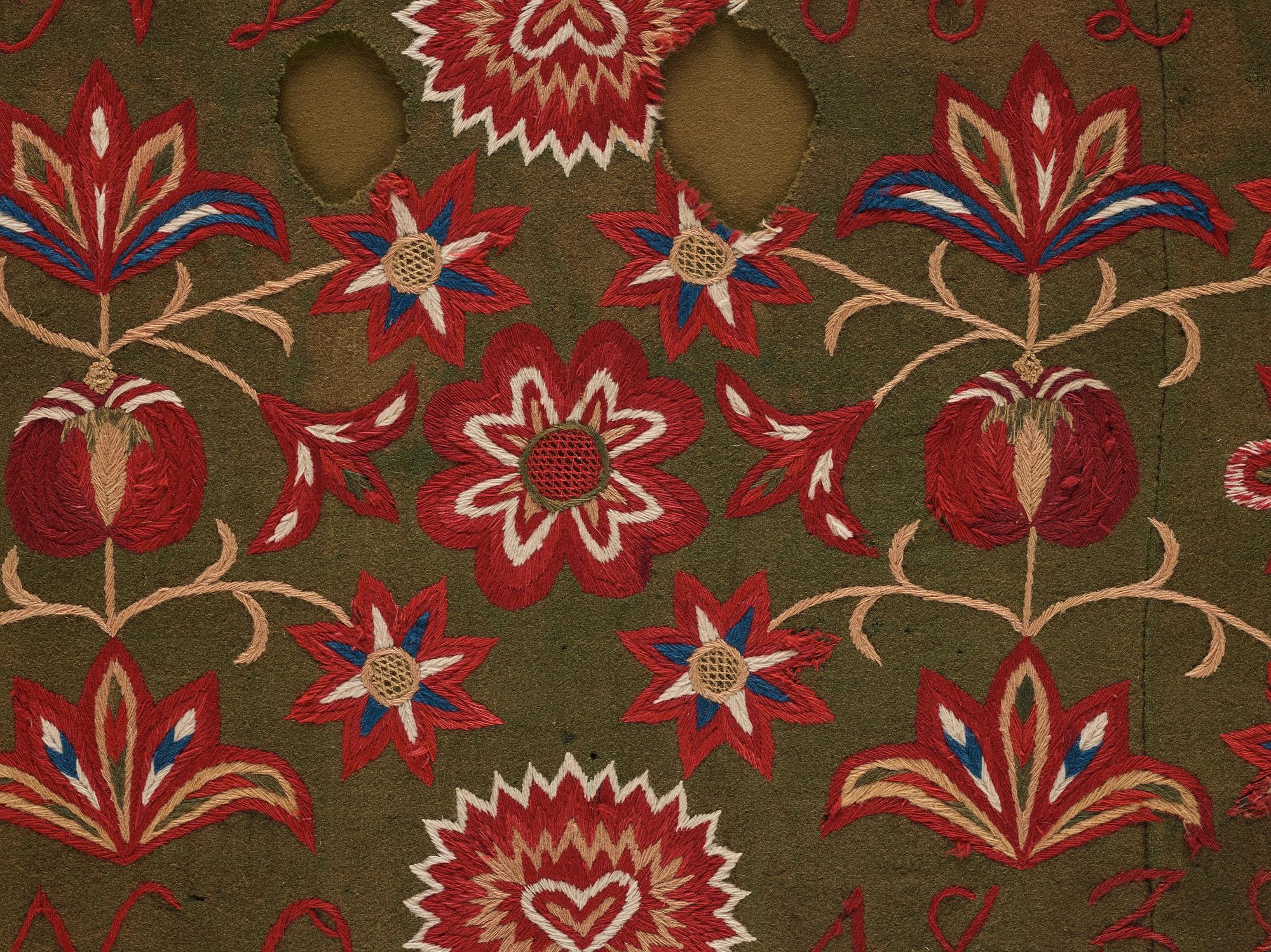 An embroidered carriage cushion, ca 51 x 113 cm (with mounting 61 x 122 cm) signed and dated END JPLG ANO 1838, Scania.