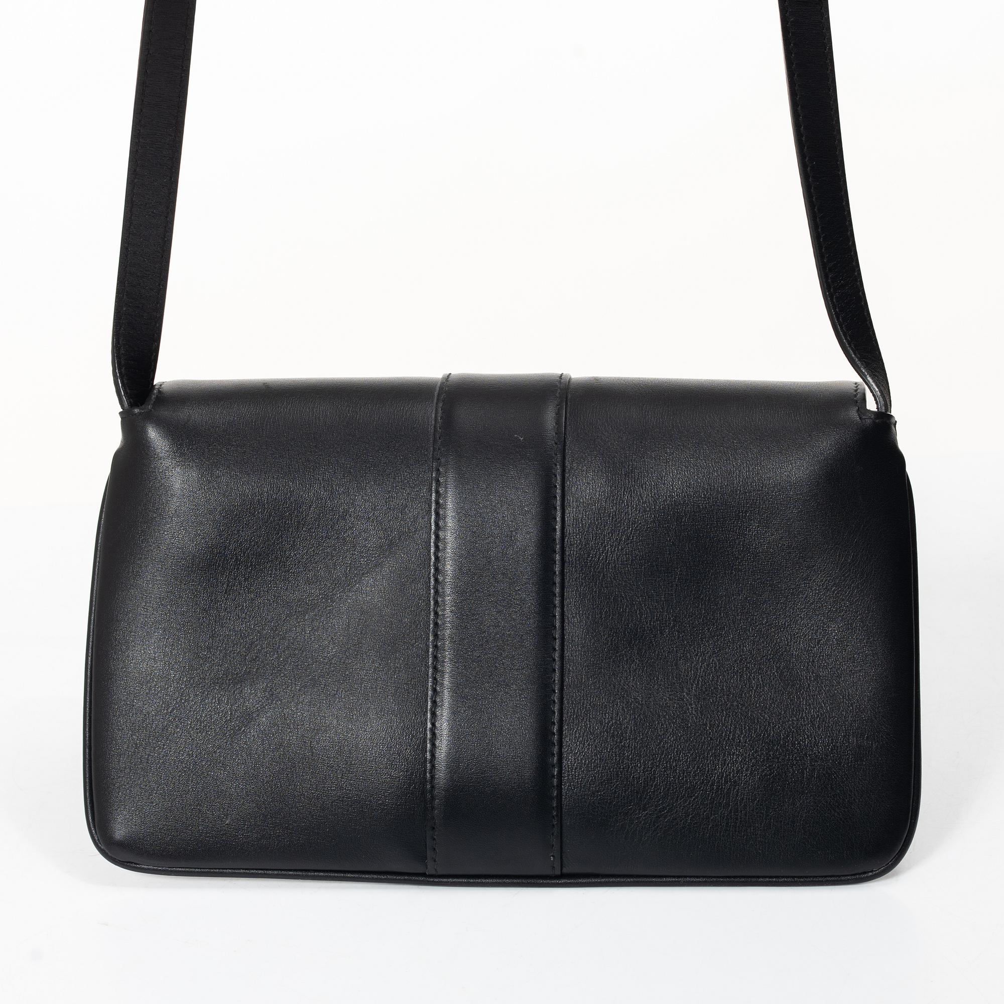 Gucci, a handbag.