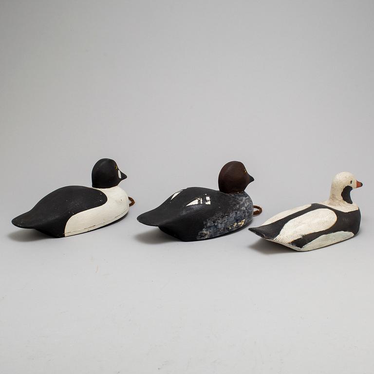 Three early 20th century painted wood birds.