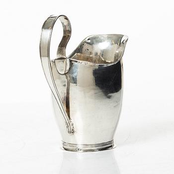 A Swedish 19th century silver creamer, mark of Nils Högrell, Stockholm 1823.