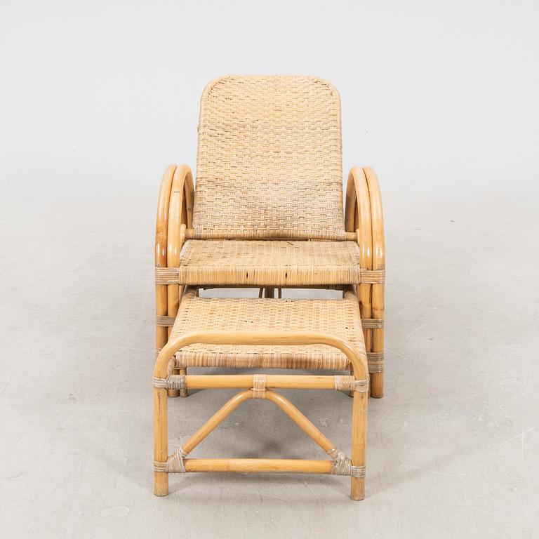 A mid 1900s rattan and bamboo garden chair.