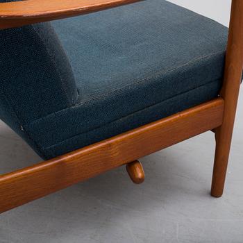 A 1950/60 easy chair and foot stool,  "Siesta" by Folke Ohlsson for Dux.