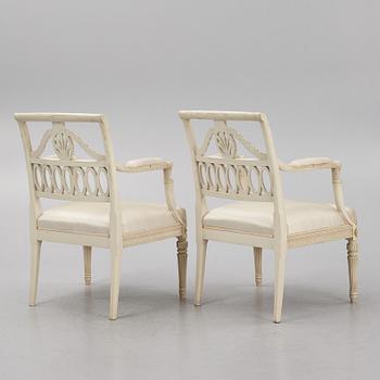 A pair of Empire style armchairs, 20th century.