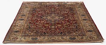 A semi-antique silk Kashan, central Persia, c. 210 x 140 cm.