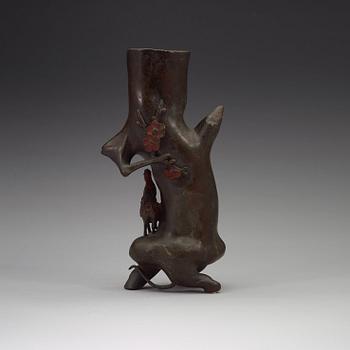 A bronze three trunk shaped vase, Qing dynasty (1644-1912).