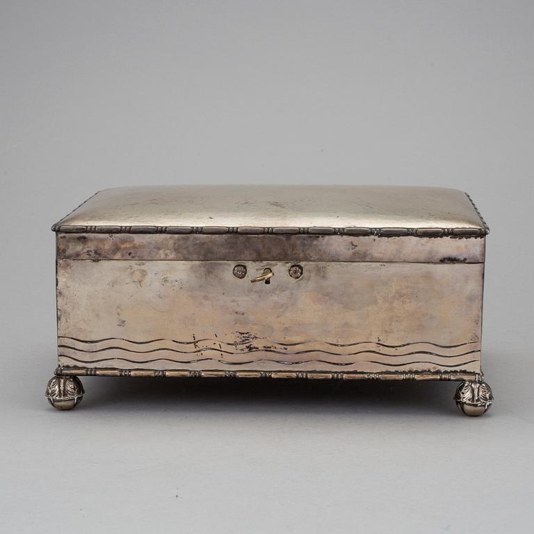 A silver jewelry box by CG Hallberg in Stockholm 1930.