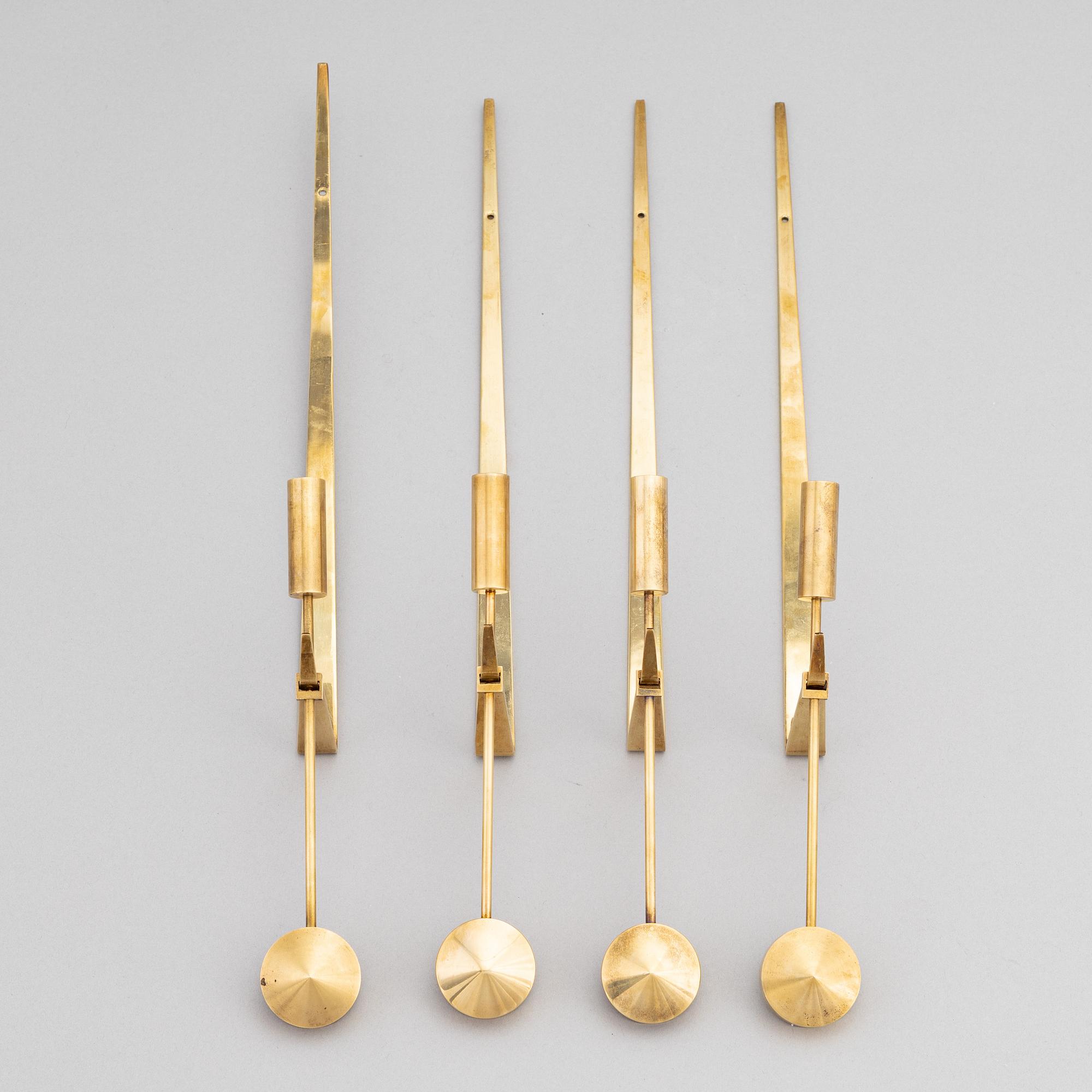 Pierre Forssell, a set of four 'Pendeln' brass wall sconces, Skultuna.