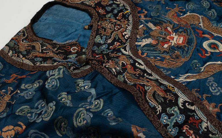 A Chinese embroidered silk robe, Qing dynasty, 19th Century.