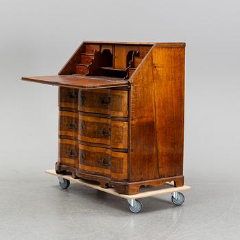 A late baroque secretaire chest of drawers, 18th century, northen Germany.