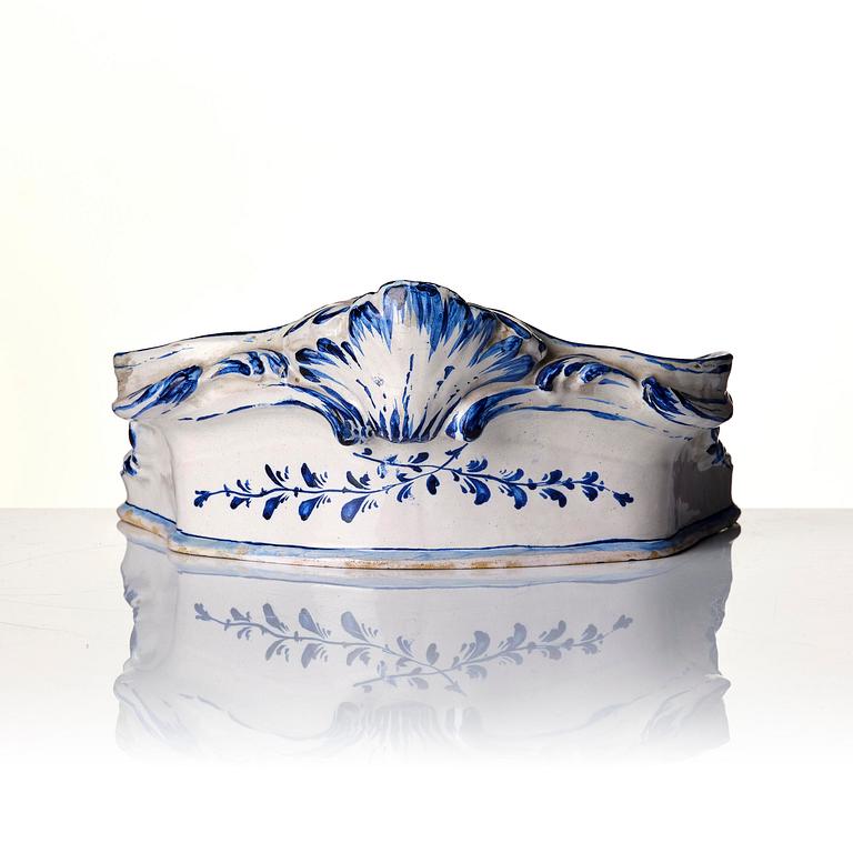 A Swedish unmarked Rörstrand rococo faience desk set, 18th century.