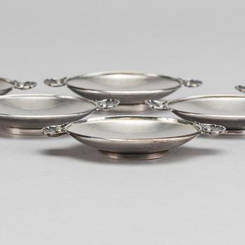 A Danish 20th century sterling set of six ashtrays, mark of G Jensen Copenhagen first half of the 19th century.