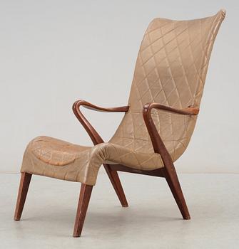 An Axel Larsson birch and leather easy chair, Bodafos, 1940's, model 1207.