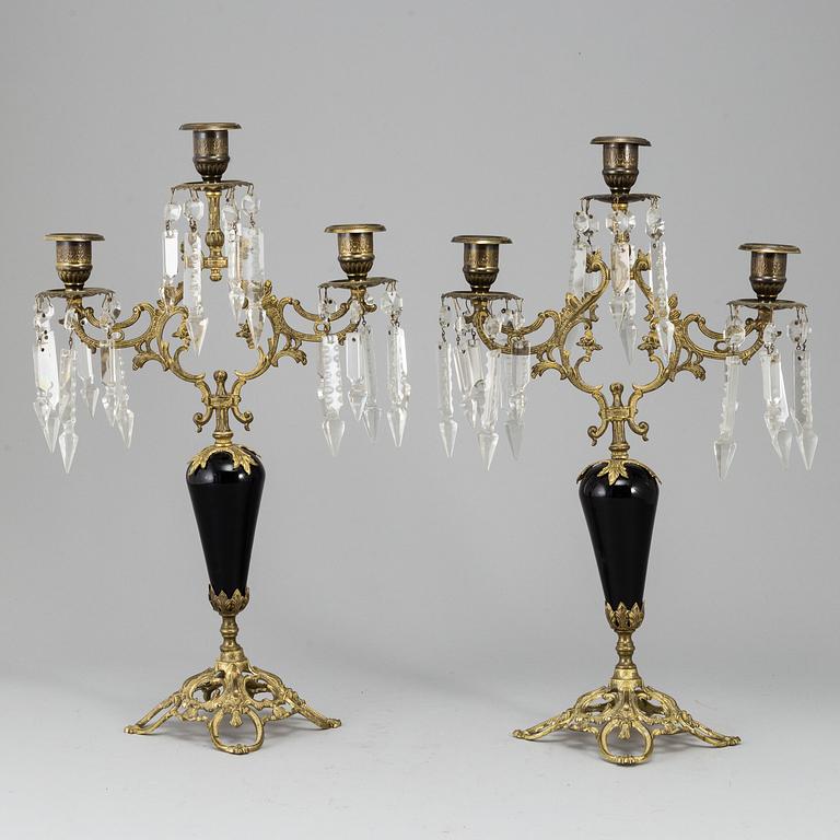 A pair of Victorian brass candelabra from around year 1900.