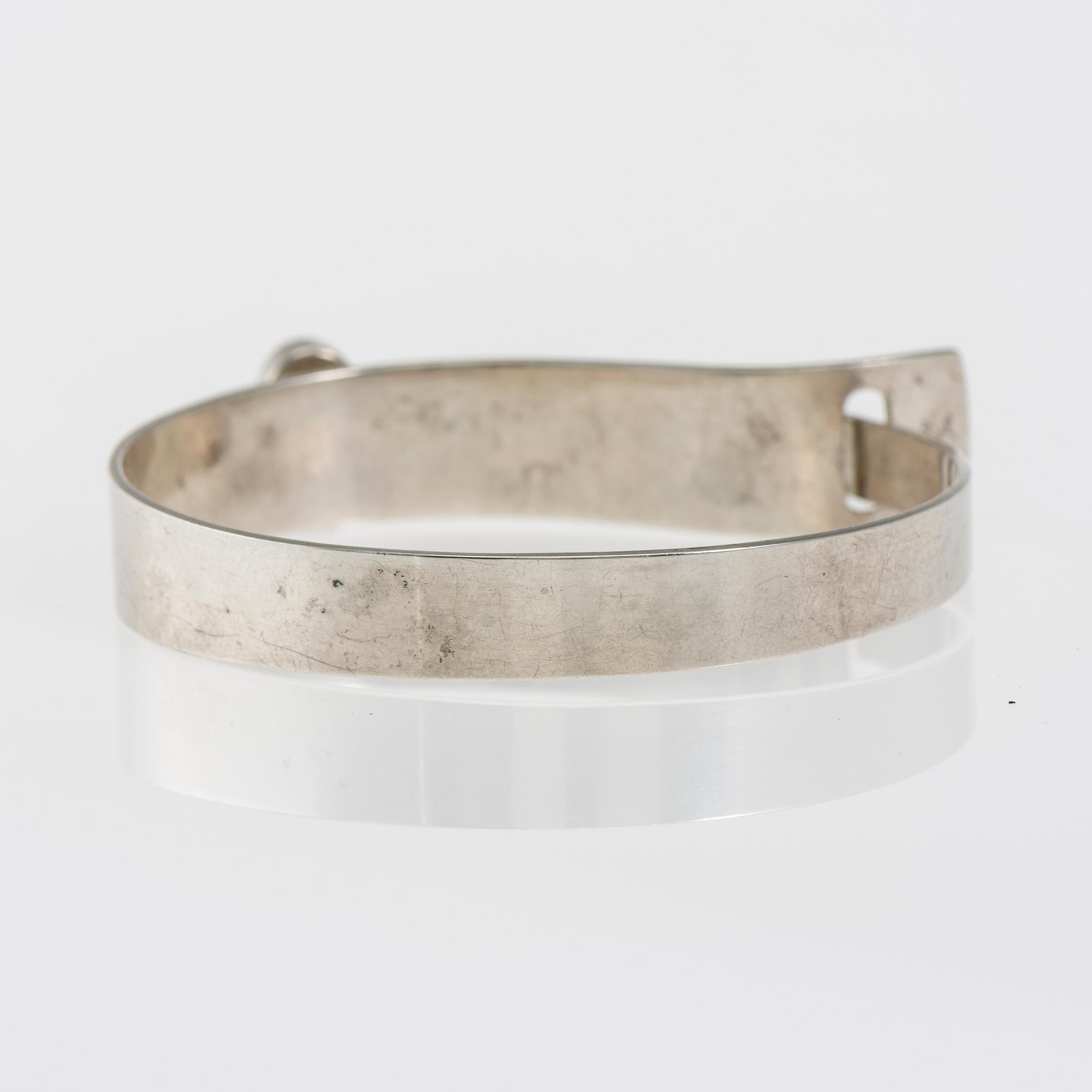 ARMBAND, silver 813, syntetisk solsten. Kupittaan Kulta 1961. Vikt ca 26,8 g.