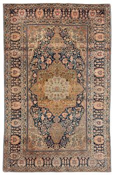 An antique Kashan 'Mohtasham' rug, c. 206 x 131 cm.
