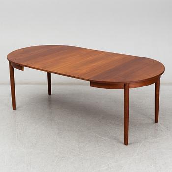 a teak dining table from the second half of the 20th century.