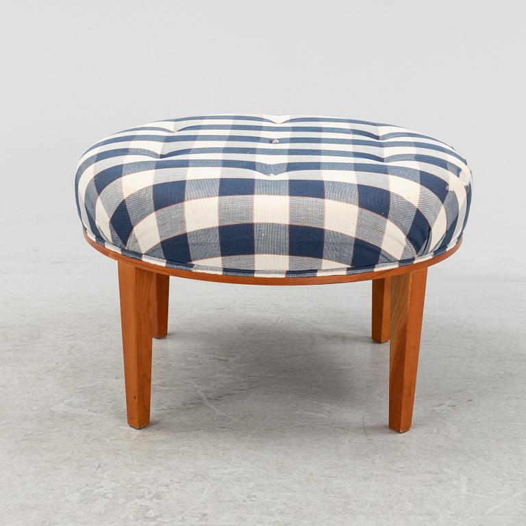 Josef Frank, a model 647 cherry wood stool by Firma Svenskt Tenn.
